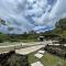 Triangular house and hot spring - Kubupenlokan