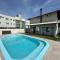 casa praia palmas 4 suítes 23 pessoas sinuca pebolim