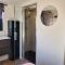 Tiny Zen House in Heinkenszand with private sauna, airco, outdoor swimming pool, WiFi and 2 bedrooms