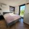 Tiny Zen House in Heinkenszand with private sauna, airco, outdoor swimming pool, WiFi and 2 bedrooms