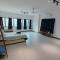 5-Person 1950s Shophouse: Vintage Charm & Smart TVs