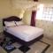 Roma Stays- Modern and stylish Two-bedroom apartment in Busia (near Weighbridge) - Busia