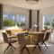 H21 - Modernes Ferienhaus 145qm, 4SZ, Wellnessbereich mit Sauna und Dachterrasse mit Panoramablick, Kühlen und Heizen mit Geothermie