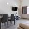 GuestHost - Al civico 5 - Mondern Apartments & Suite!