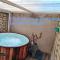 L'Antique SPA: jacuzzi sous patio - 奥朗日