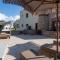 Pithos Apartments