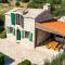 Dalmatian stone villa with heated pool
