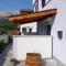 Apartment in the house with pool, ground floor