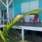 San Salvador Luxury Direct Beach Front Apartment 2 bedroom 1 bath full kitchenin San Salvador, Bahamas - Кокберн-Таун