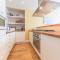 Enjoy relaxing family breaks in this central Ambleside apartment with parking