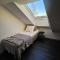 Attic floor with views over fields and sea