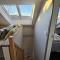 Attic floor with views over fields and sea