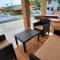 LS Resthouse - Loft studio with pool and garden access