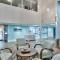 The Scallop by Brightwild-Beachfront Condo