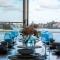 Stunning waterfront townhouse with shared swimpool, harbour view and free P