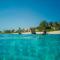 3 SUITES AT BLUE PAVILION - 3 KITCHENS - Steps to BEACH - Car, Value, Service - West Bay
