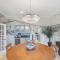 Waterfront Vacation Home with Heated Pool Dock and Beach Nearby