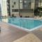 2BR condo in BGC with WiFi/Netflix/Disney+
