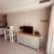 Rising Sun- Bright 1BR Apartment with Pool & Terrace, Steps from Corralejo Beach