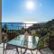 Studio Apartments with large swimming pool and Sea view at Pelekas Beach, Corfu