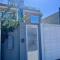Cobertura Duplex no Campeche Florianópolis, 2 quartos com ar-condicionado, 3 banheiros, WiFi 1Gb, Cozinha completa, Estacionamento, Amplo terraço coberto com churrasqueira - فلوريانوبوليس