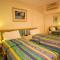 Ivy at Coral Horizons: A Retro Beachfront Locale