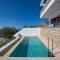 Villa Marelia - Seafront villa with infinity pool