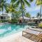 Poolside Relaxation - Resort Retreat with Beach Access
