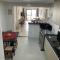 Apartamento Praia do Morro com Churrasqueira, Cozinha Gourmet e Wifi