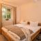 Ferienhaus am Ufer - Ferienwohnung Strandsand