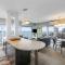 NewMark Tower’s Water Wheel Condo with Sea Views