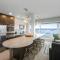 NewMark Tower’s Water Wheel Condo with Sea Views
