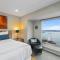 NewMark Tower’s Water Wheel Condo with Sea Views