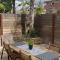Cozy Private Bungalow walkable to beach! - 30 days or more ONLY