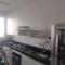 Apartamento com AR Condicionado, Condomínio aconchegante com piscina 2 Qts - 塞拉