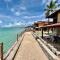 A private chale less than 20 feet from the ocean