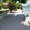 Le Coin des Cygnes, appartement face au lac dAnnecy avec plage privée