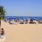 Poolside getaway seaside flat in Rosolina