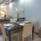 Cozy 2BR with FREE Pool beside SM City Mall
