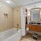 Beachfront 2BR 3BA Condo by CozySuites