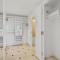 Beachfront 2BR 3BA Condo by CozySuites