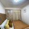 Cozy Condo with Swimming Pool, WIFI & Netflix good for 4PAX