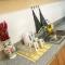Cozy Condo with Swimming Pool, WIFI & Netflix good for 4PAX