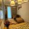 Cozy Condo with Swimming Pool, WIFI & Netflix good for 4PAX