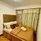 Cozy Condo with Swimming Pool, WIFI & Netflix good for 4PAX
