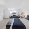 Modern 2BR 3BA Condo on the Boardwalk by CozySuites