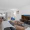 Modern 2BR 3BA Condo on the Boardwalk by CozySuites