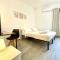 Bonora Suites with Sharing Living room and Kitchen
