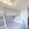 A Factoria Beach House by Prishomes