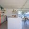 A Factoria Beach House by Prishomes